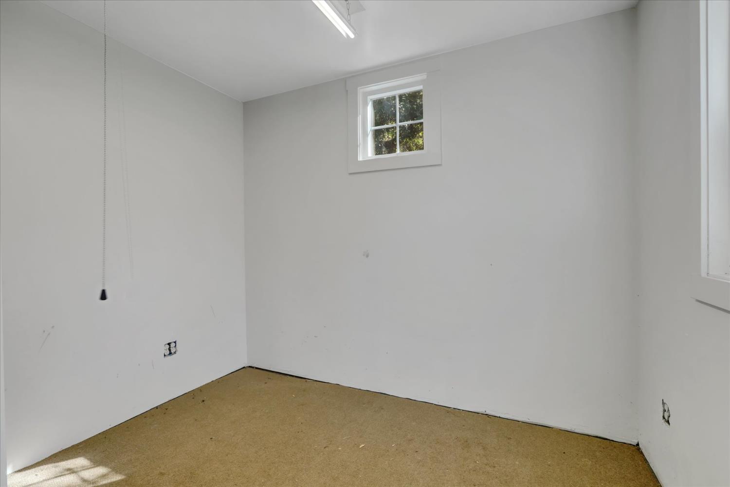 12562 Rough And Ready Highway Grass Valley, CA 95945 - Photo 76 of 99 a view of a small space with a window