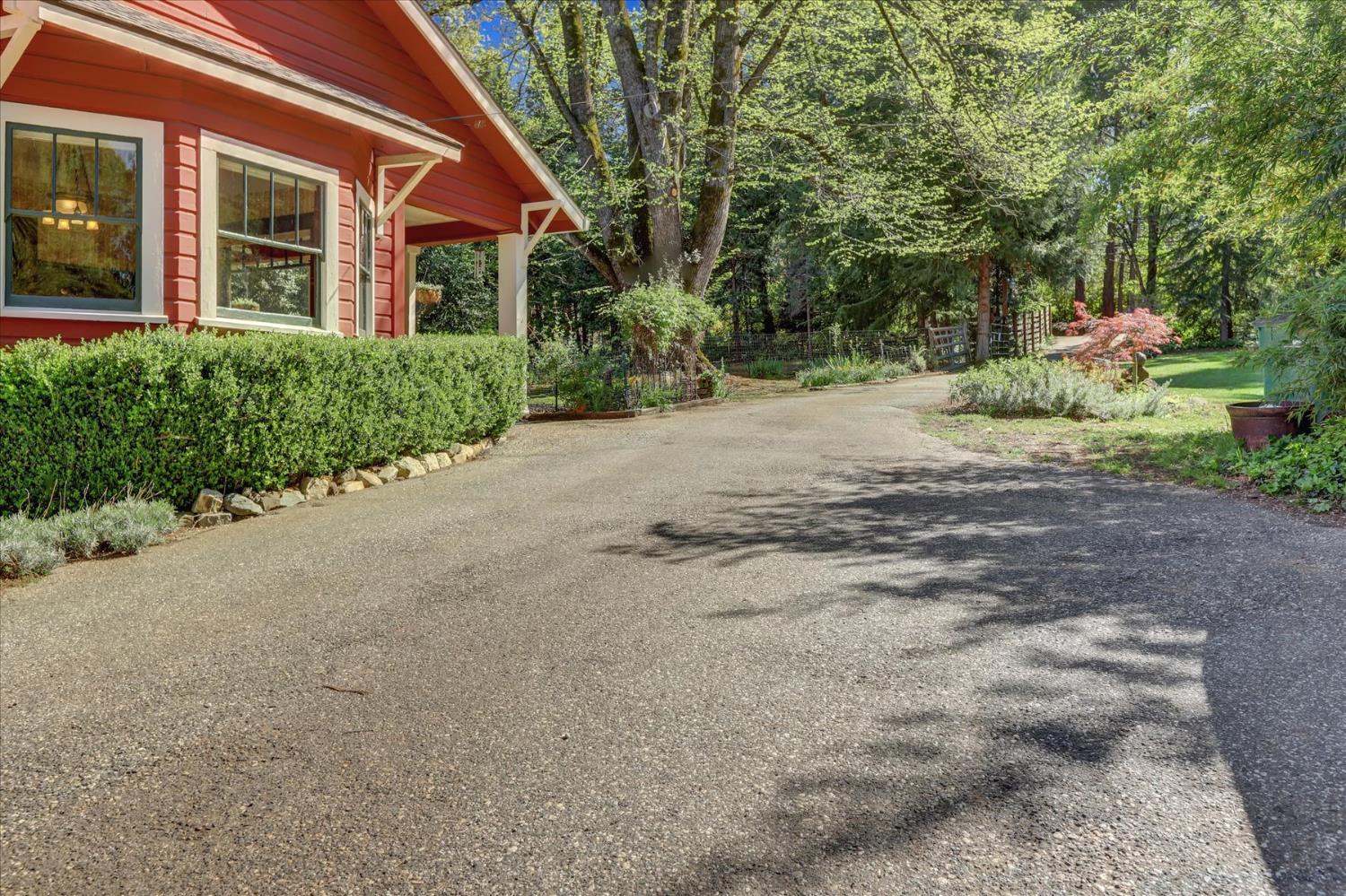 12562 Rough And Ready Highway Grass Valley, CA 95945 - Photo 85 of 99 a view of a house with a yard and pathway