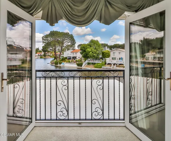 a stove top oven sitting inside of a kitchen
