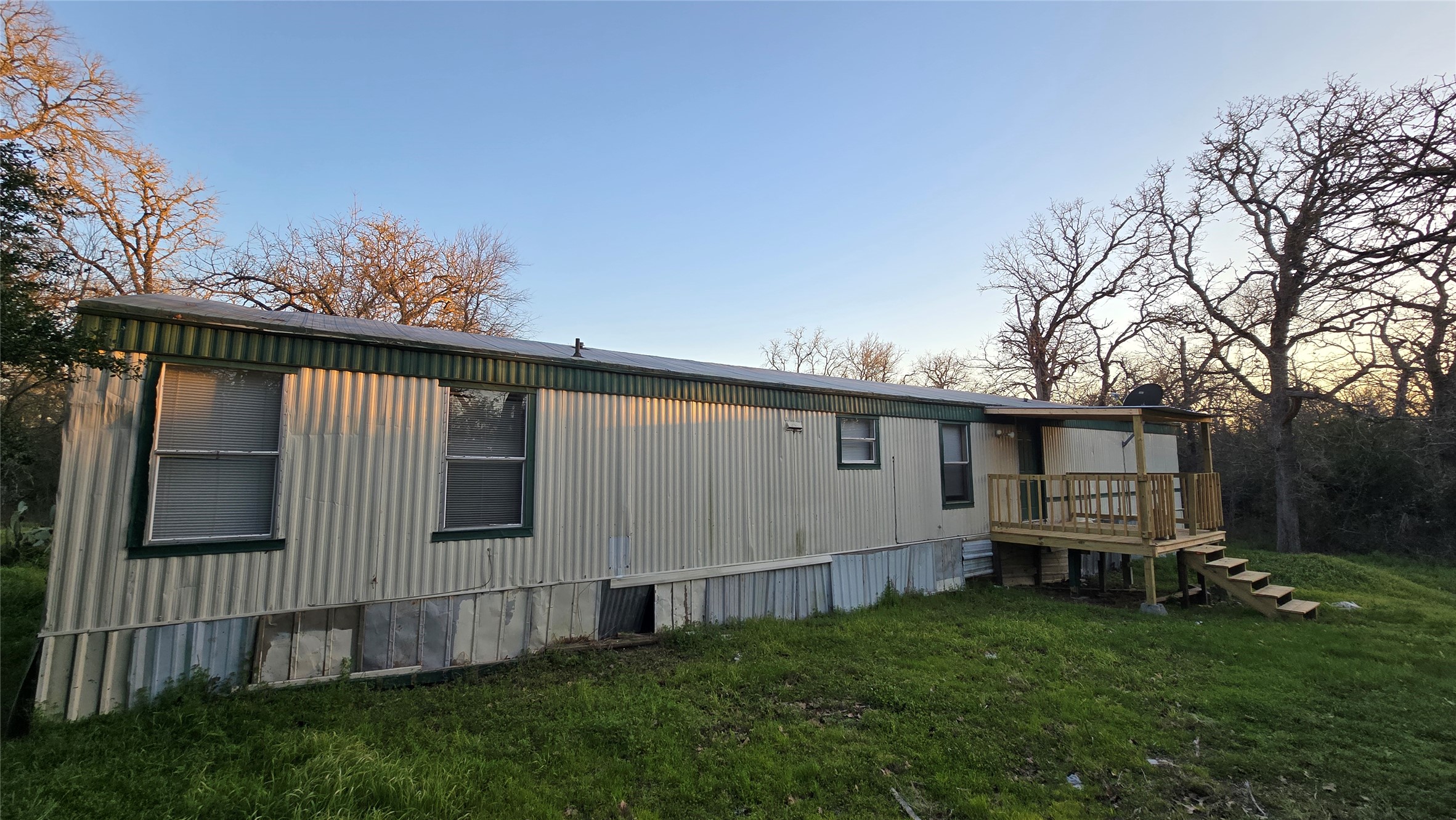 8315 Burleson Manor Road, Unit B Manor, TX 78653 - Photo 3 of 15 Rear view of house with a lawn