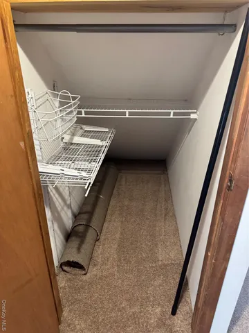 a view of a balcony with chairs