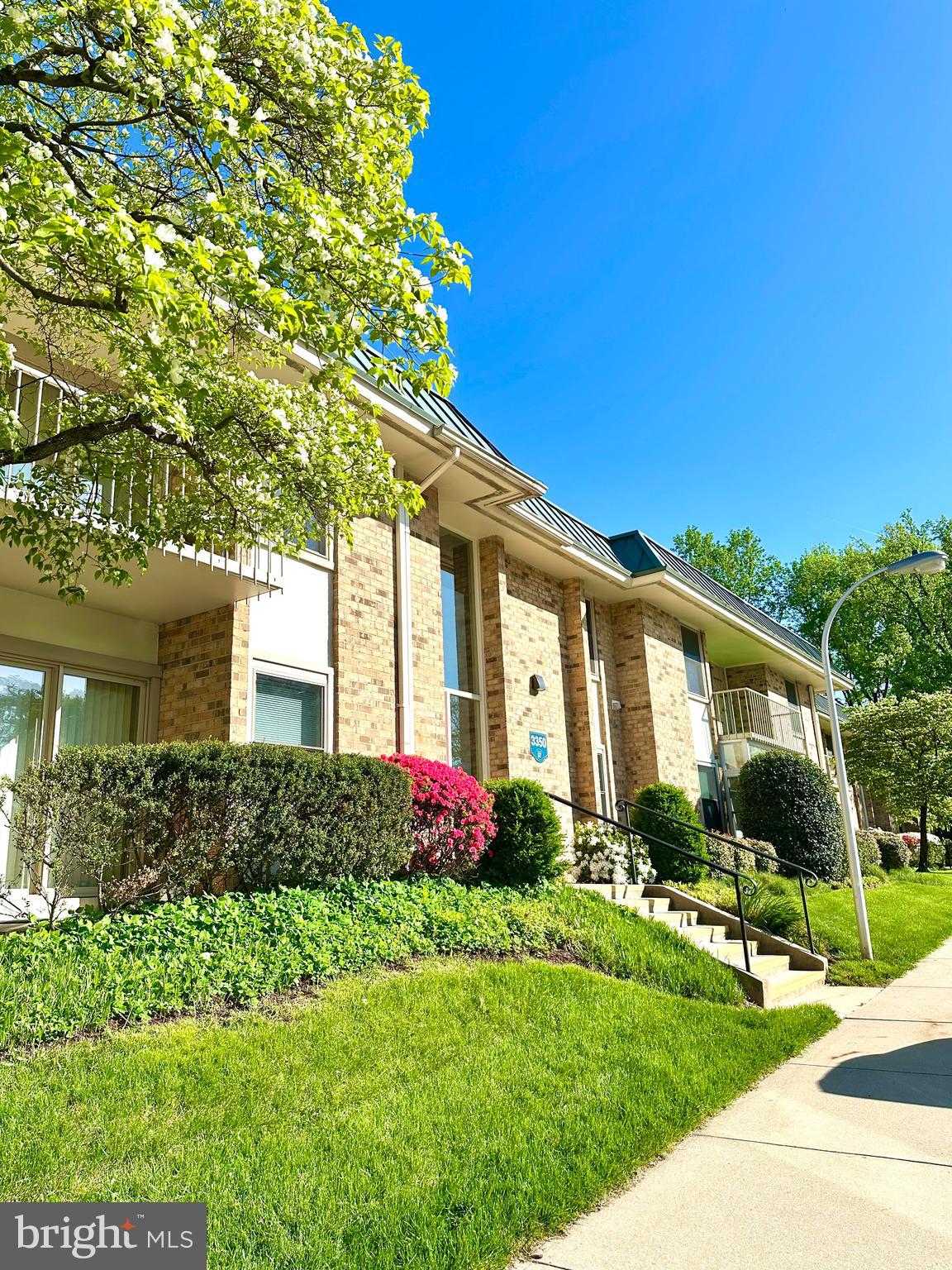 3350 Chiswick Court, Unit 573C Silver Spring, MD 20906 - Photo 1 of 43 a front view of house with yard and green space