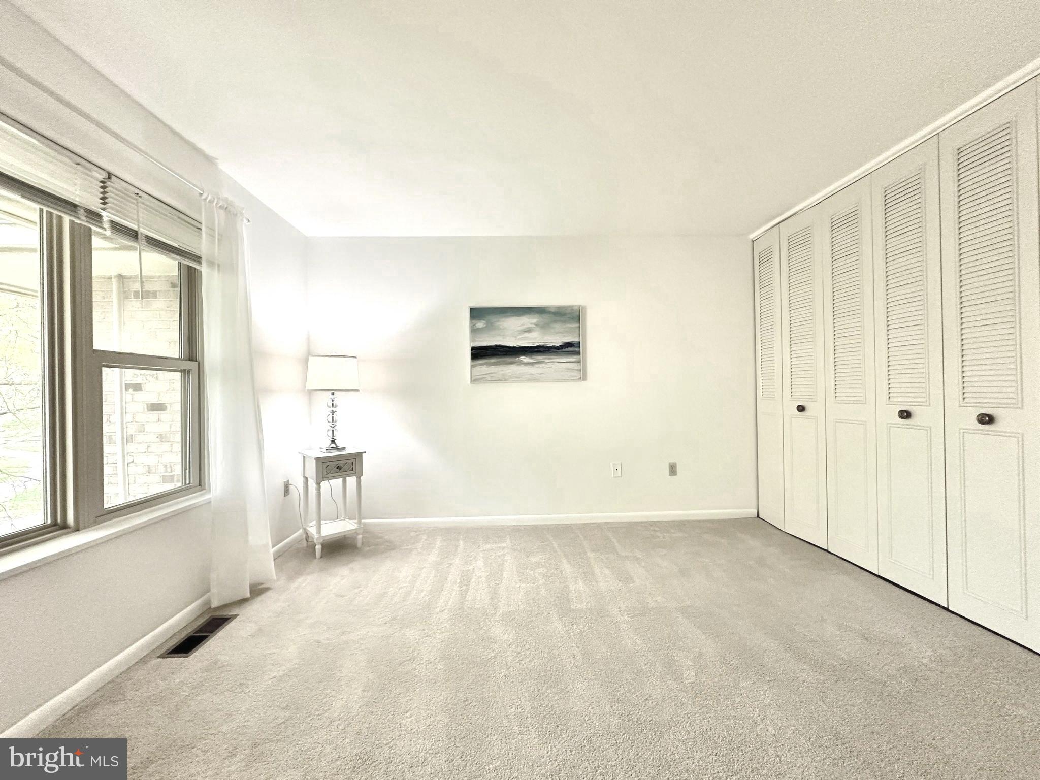 3350 Chiswick Court, Unit 573C Silver Spring, MD 20906 - Photo 15 of 43 an empty room with windows