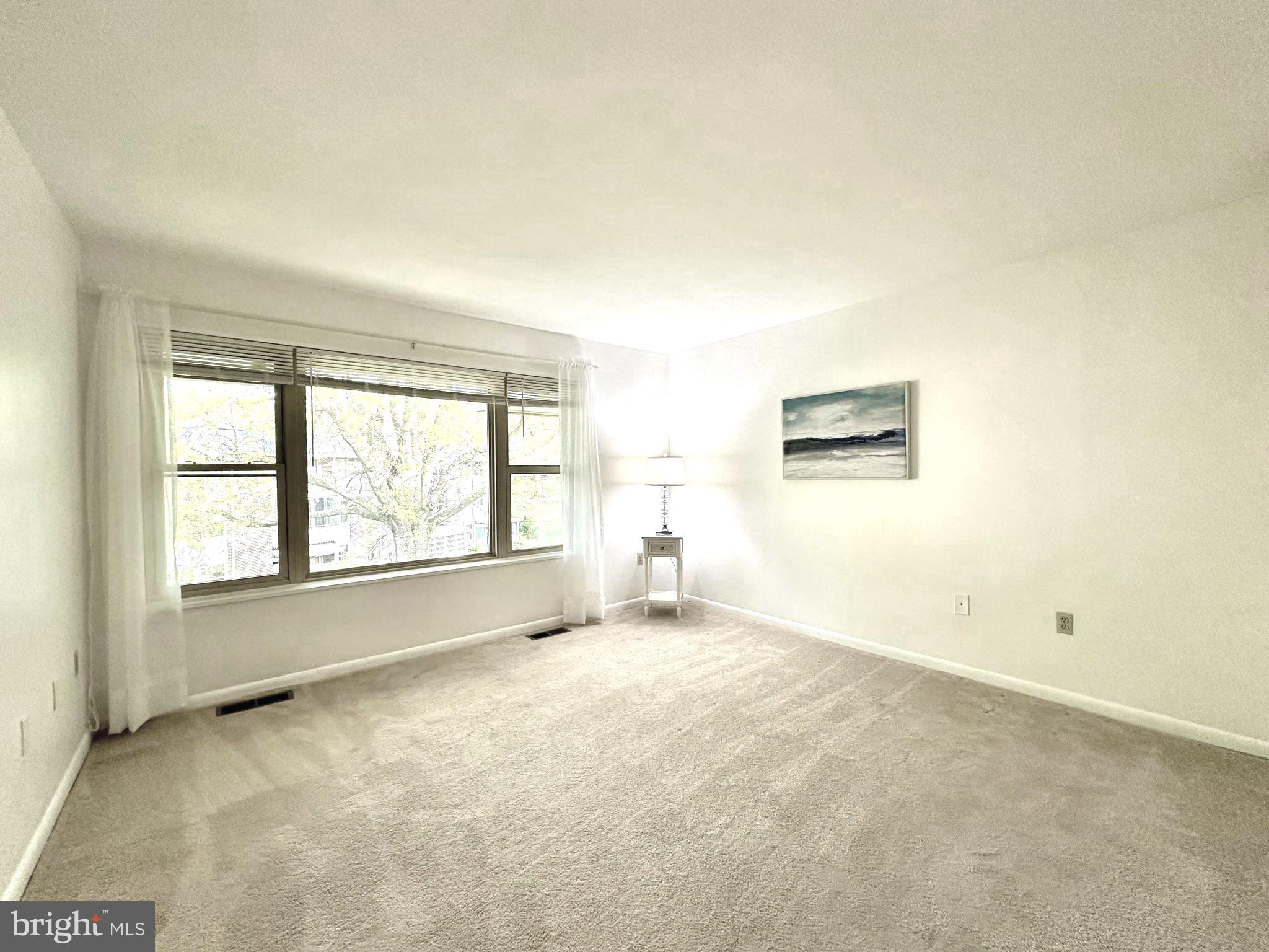 3350 Chiswick Court, Unit 573C Silver Spring, MD 20906 - Photo 16 of 43 an empty room with windows