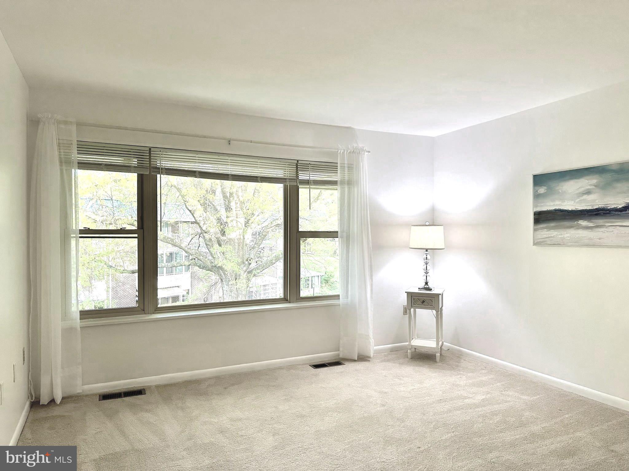 3350 Chiswick Court, Unit 573C Silver Spring, MD 20906 - Photo 17 of 43 a view of an empty room with a window