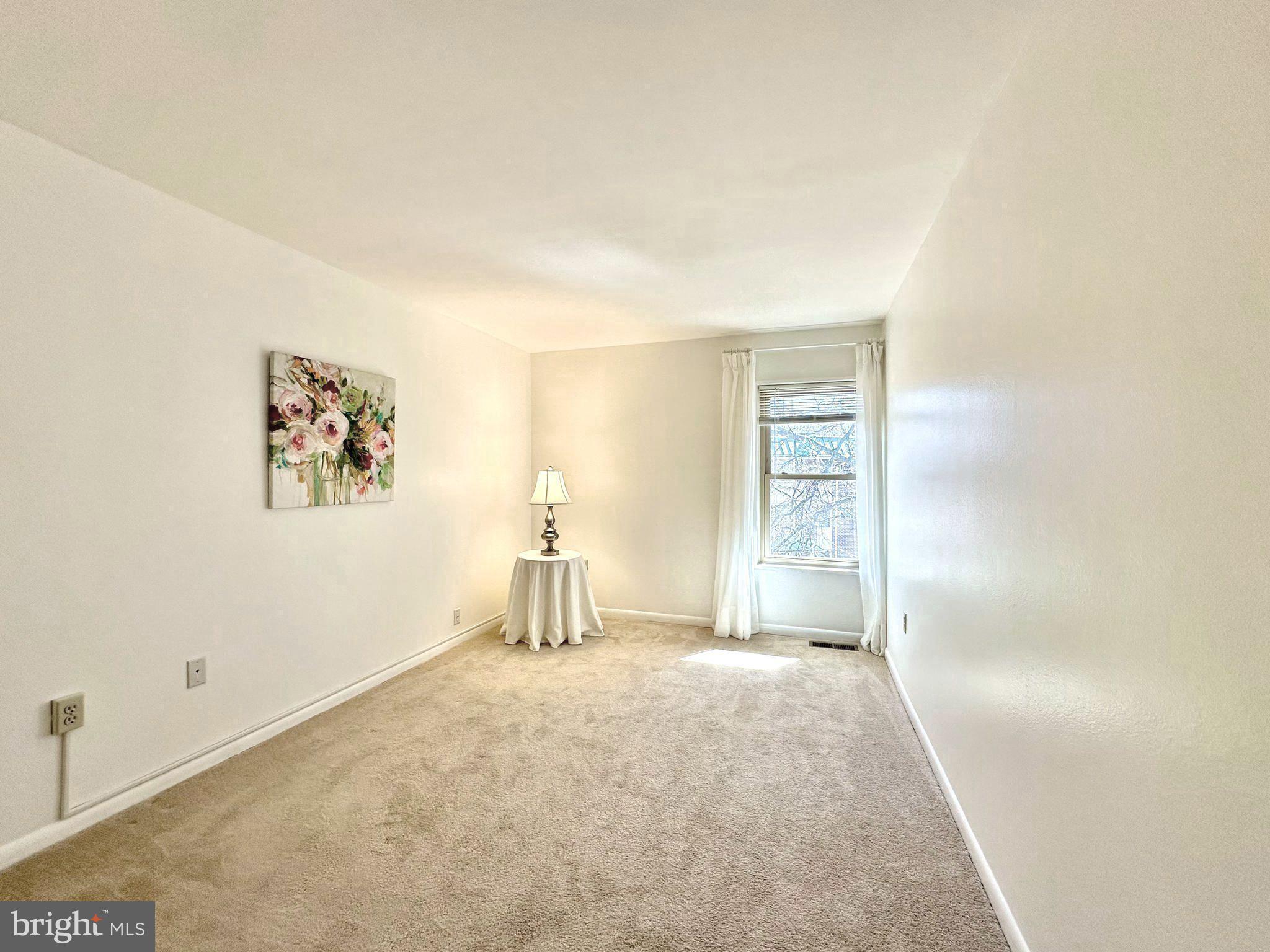 3350 Chiswick Court, Unit 573C Silver Spring, MD 20906 - Photo 20 of 43 a view of empty room with a fireplace