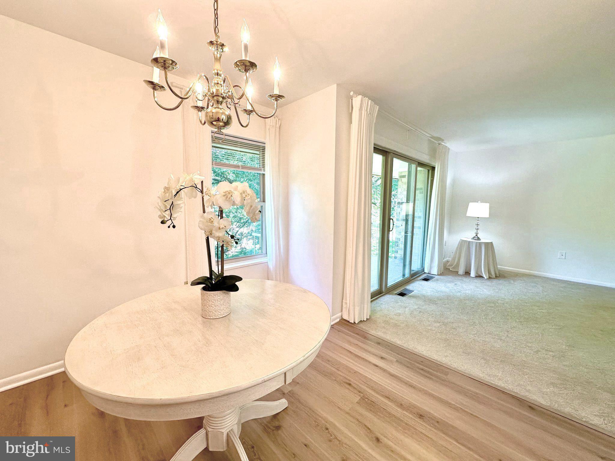 3350 Chiswick Court, Unit 573C Silver Spring, MD 20906 - Photo 10 of 43 a view of a chandelier in a room