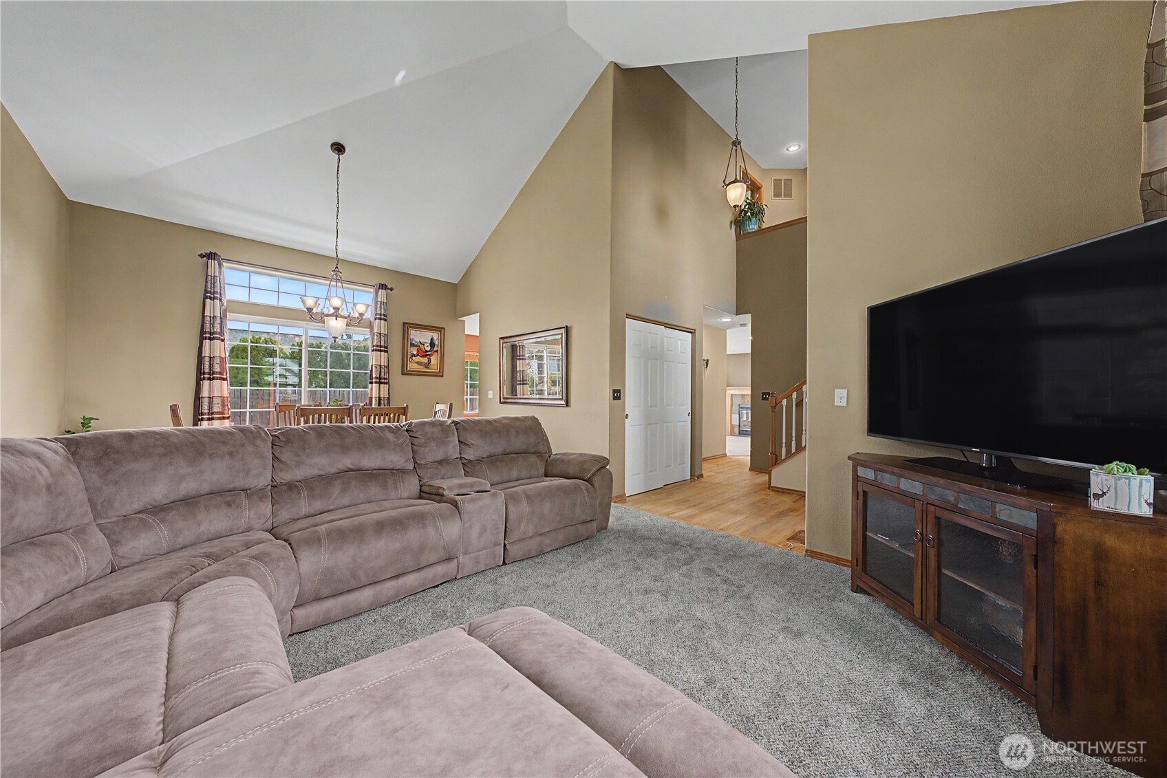 1929 Hideaway Place Wenatchee, WA 98801 - Photo 13 of 35 a living room with furniture and a flat screen tv