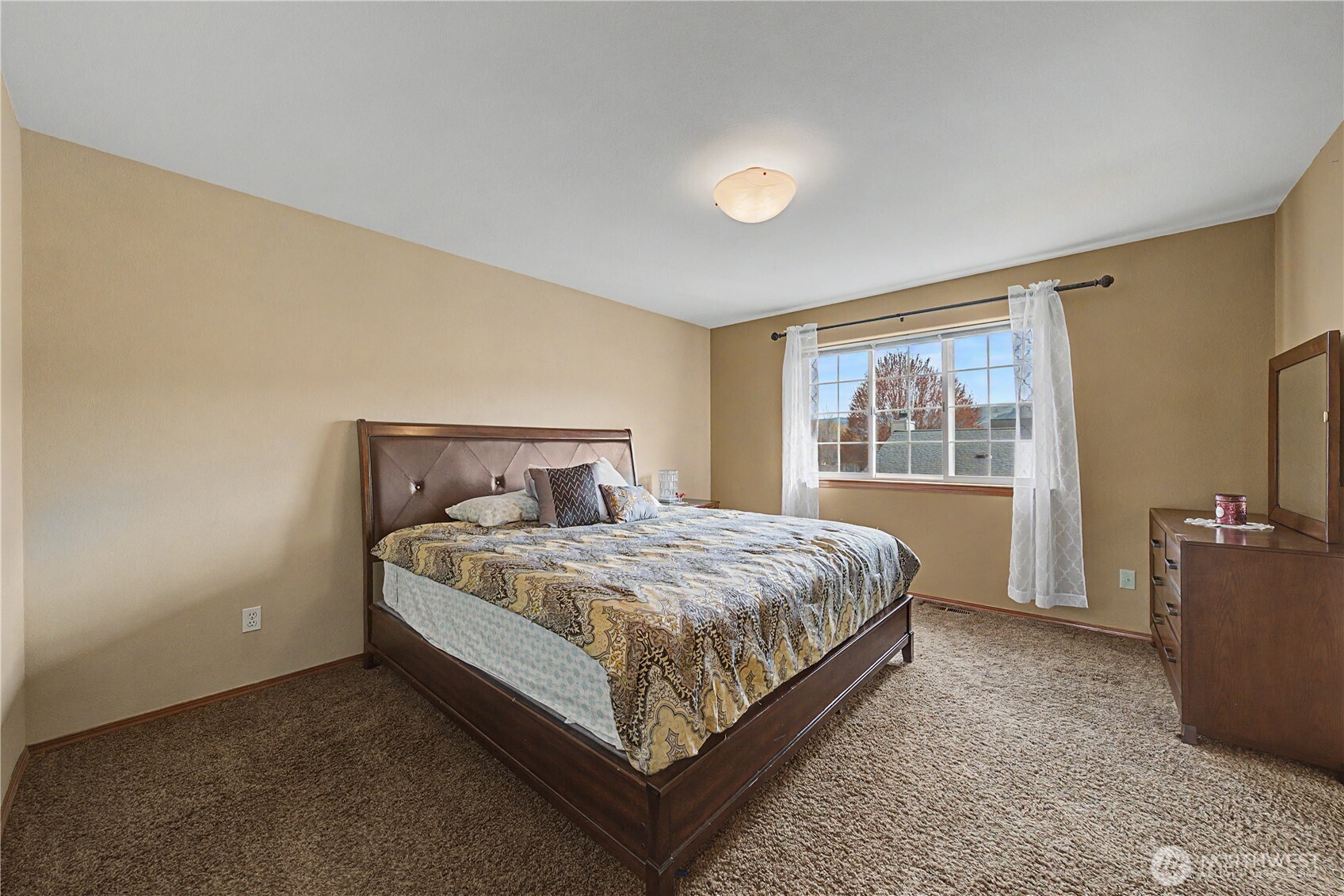 1929 Hideaway Place Wenatchee, WA 98801 - Photo 15 of 35 a bed sitting in a spacious bedroom next to a window
