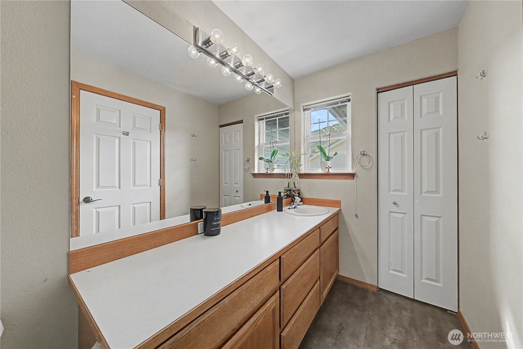 1929 Hideaway Place Wenatchee, WA 98801 - Photo 20 of 35 a room with a sink vanity and mirror