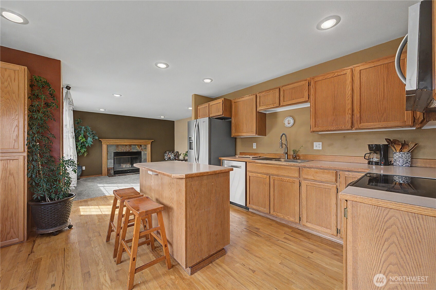 1929 Hideaway Place Wenatchee, WA 98801 - Photo 7 of 35 a kitchen with furniture a refrigerator and a sink