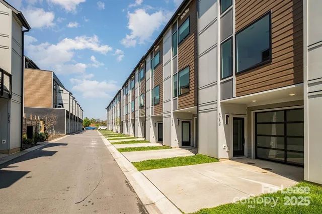 a view of a building with a street
