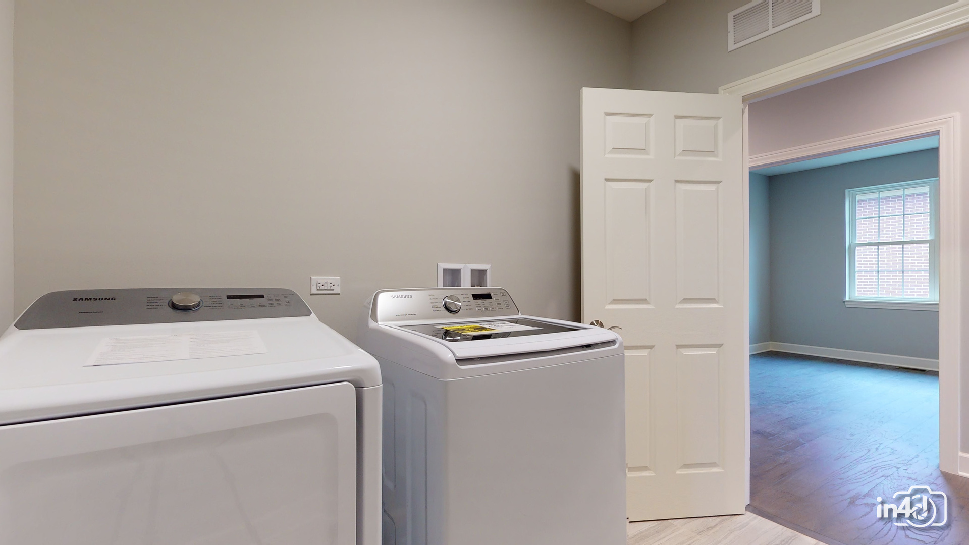 1431 Somerset Place Barrington, IL 60010 - Photo 17 of 28 a utility room with dryer and washer