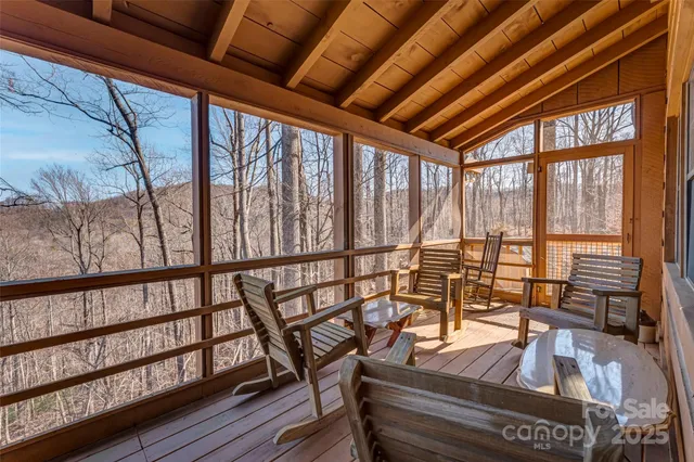 a view of a chairs on the roof deck