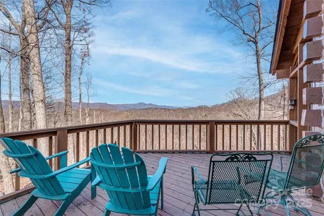 swimming pool view with outdoor seating