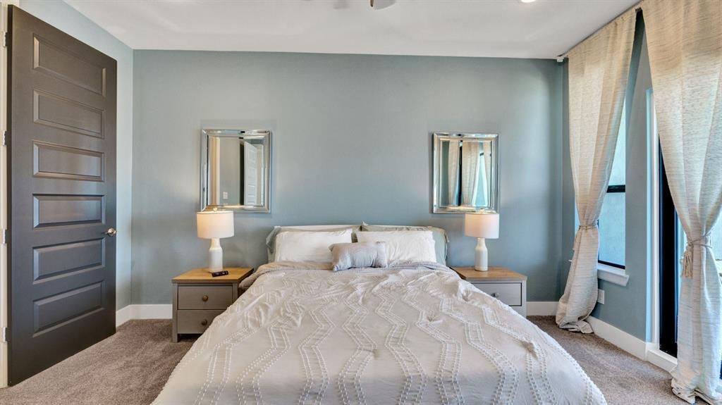 602 Winners Circle Rowlett, TX 75088 - Photo 12 of 28 Carpeted bedroom with baseboards