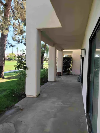 a view of a porch with garden