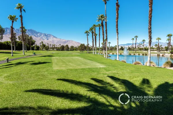 a view of a golf course with a garden