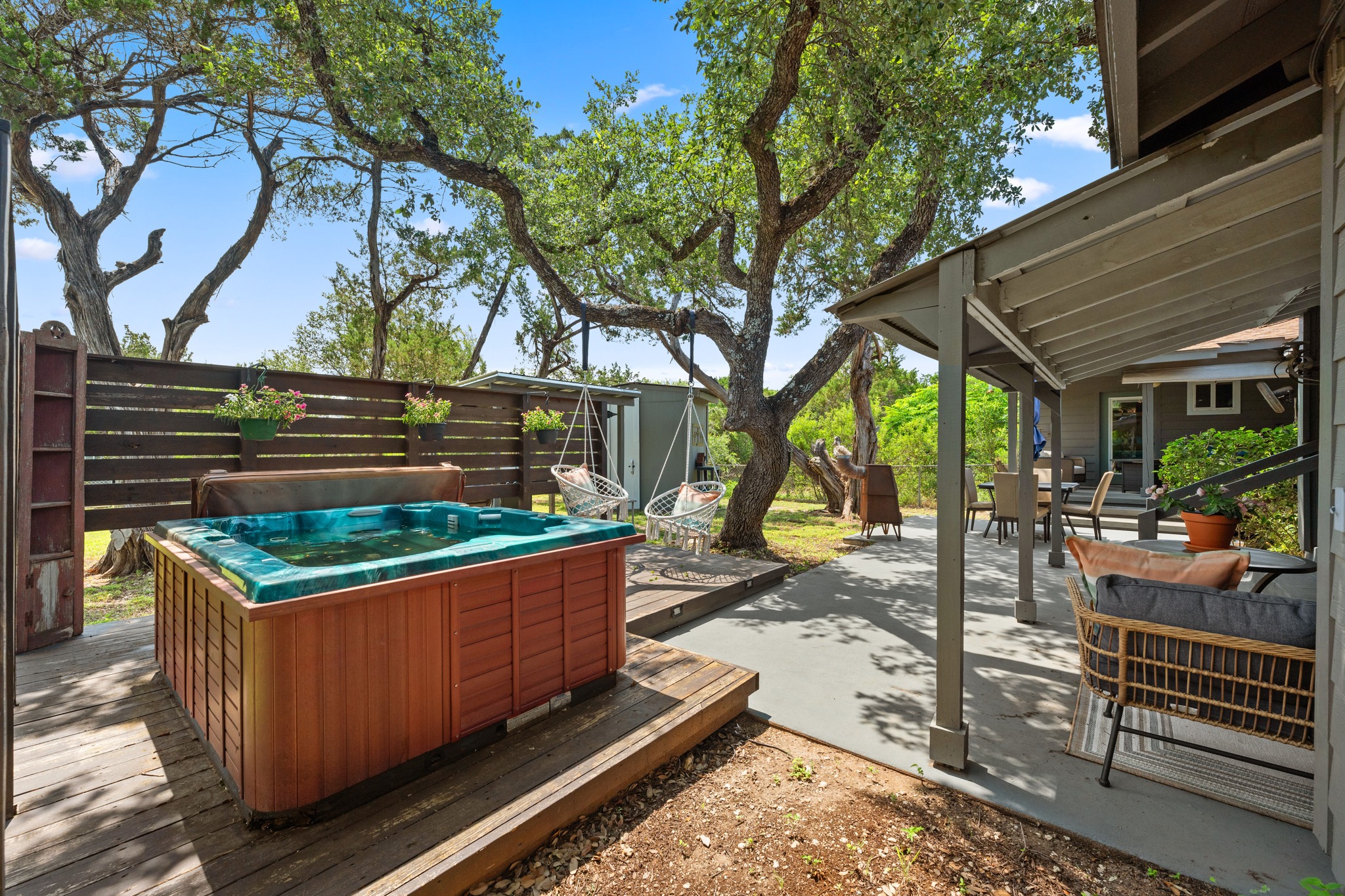 12932 Nutty Brown Road Austin, TX 78737 - Photo 35 of 40 The Ranch - Private hot tub and expansive deck create the perfect outdoor retreat.