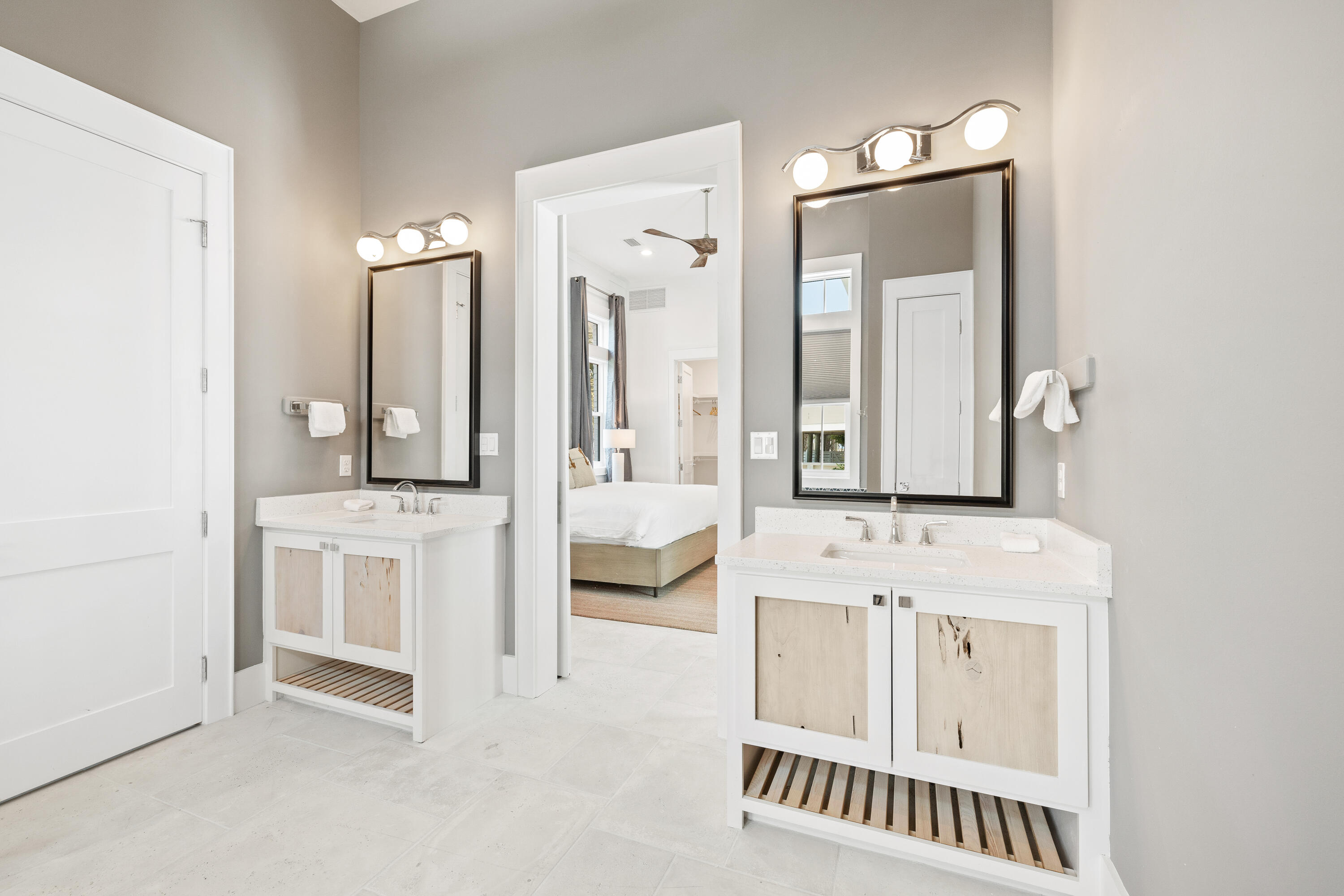 196 South Wall Street Inlet Beach, FL 32461 - Photo 31 of 85 a en suite bathroom with a double vanity sink and mirror