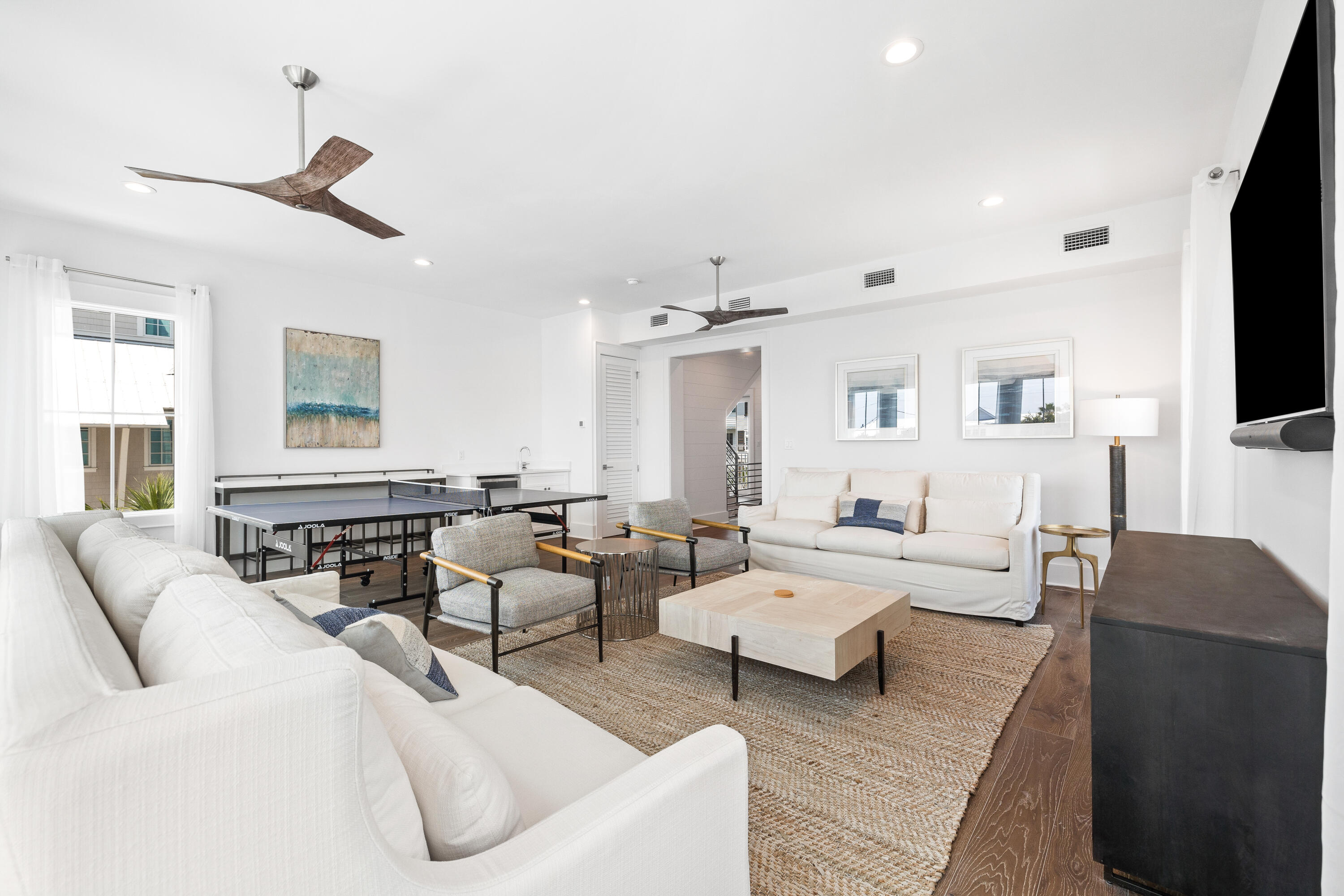 196 South Wall Street Inlet Beach, FL 32461 - Photo 41 of 85 a living room with furniture and a flat screen tv