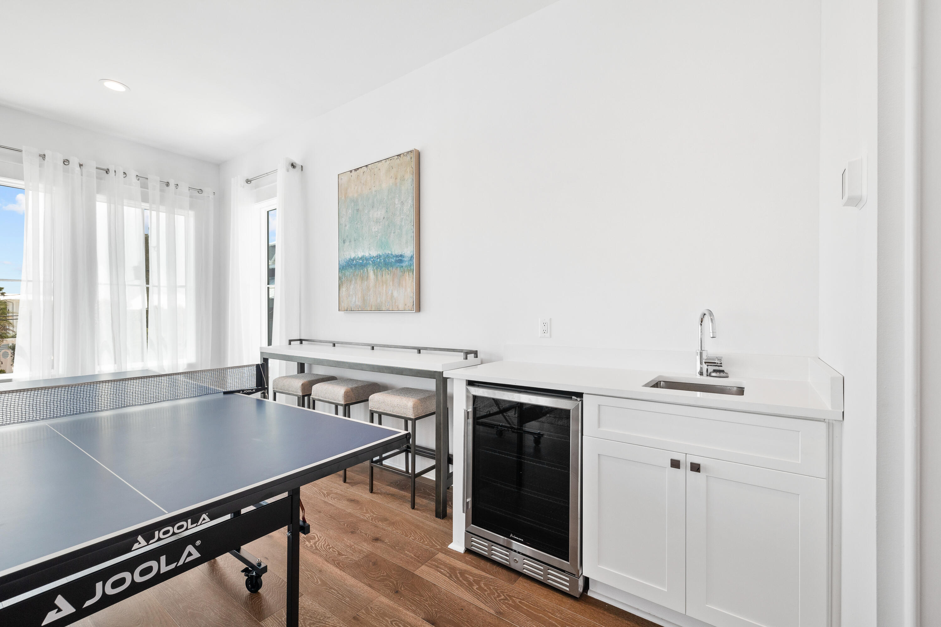 196 South Wall Street Inlet Beach, FL 32461 - Photo 43 of 85 a room with a table chairs and a window