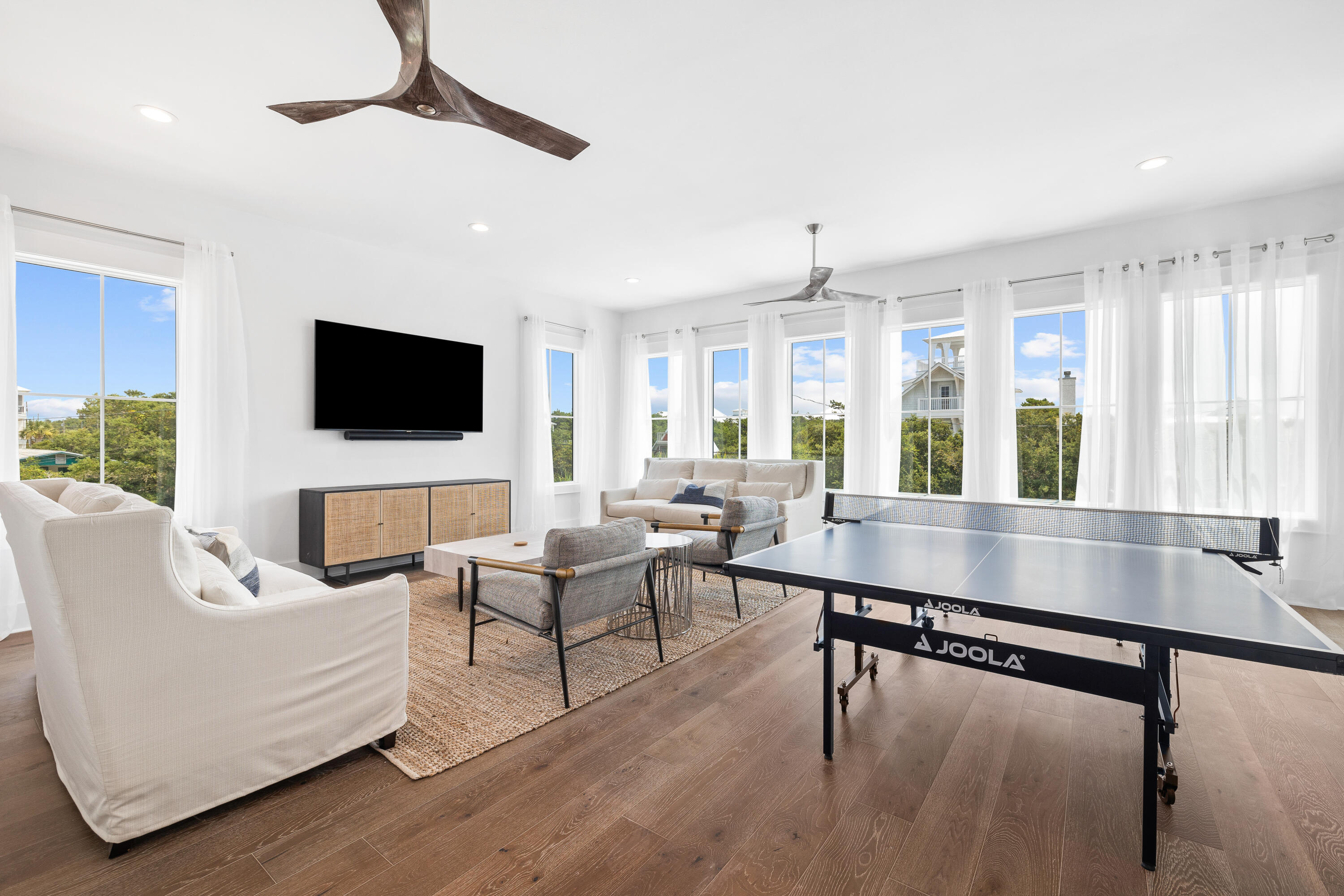 196 South Wall Street Inlet Beach, FL 32461 - Photo 44 of 85 a living room with furniture flat screen tv and a large window