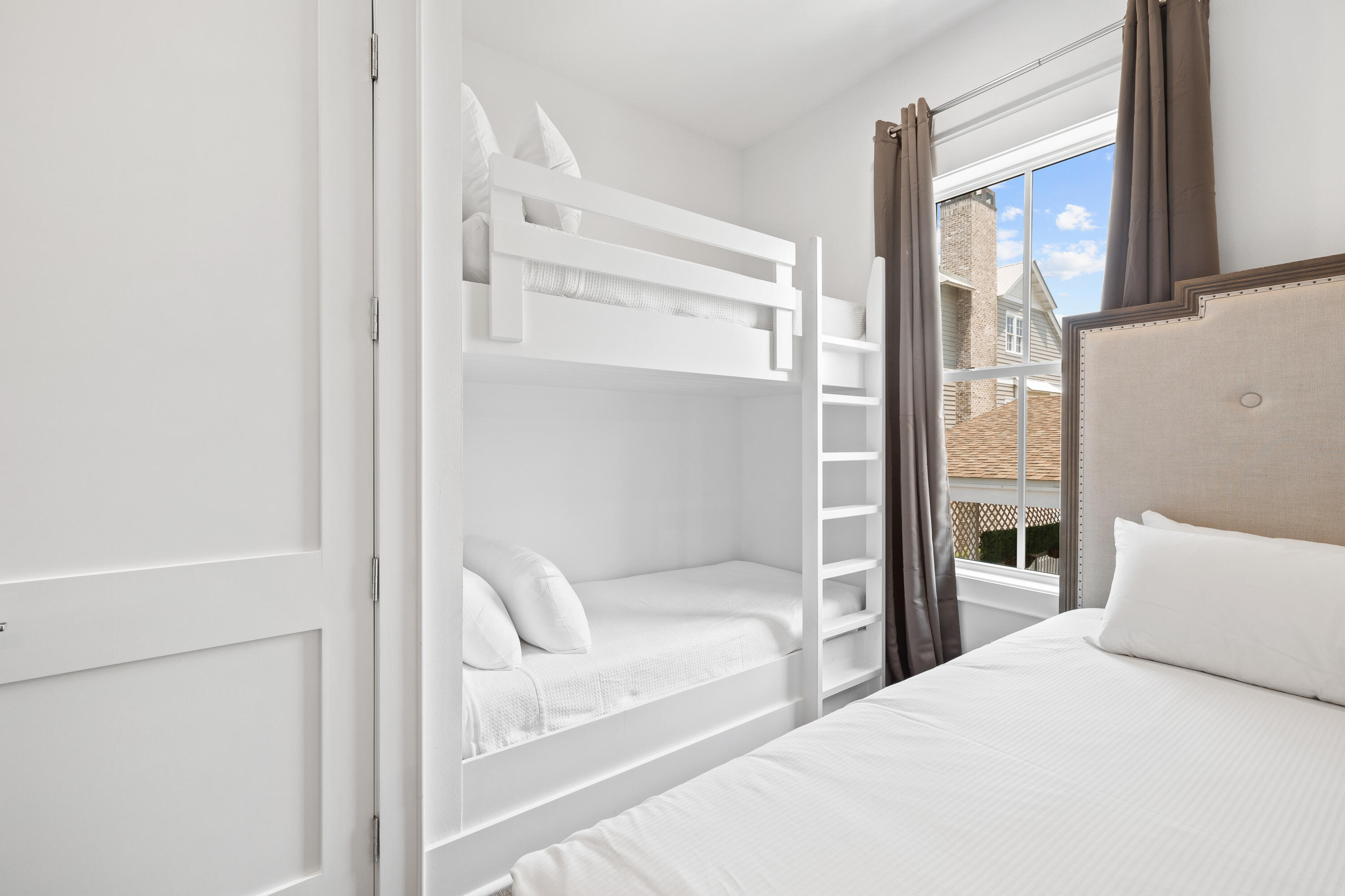 196 South Wall Street Inlet Beach, FL 32461 - Photo 54 of 85 a bedroom with a bed and a window