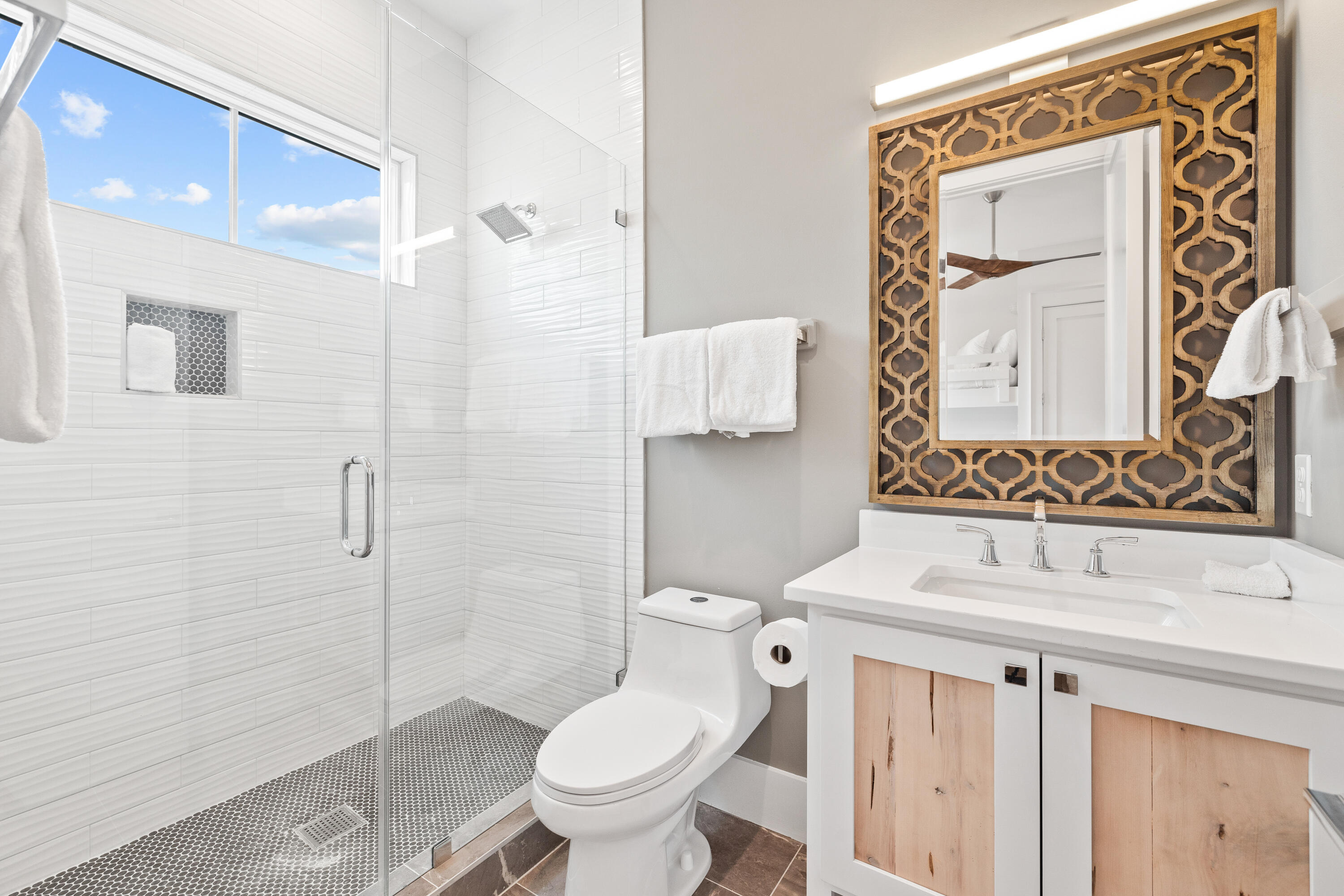 196 South Wall Street Inlet Beach, FL 32461 - Photo 55 of 85 a bathroom with a sink toilet and shower