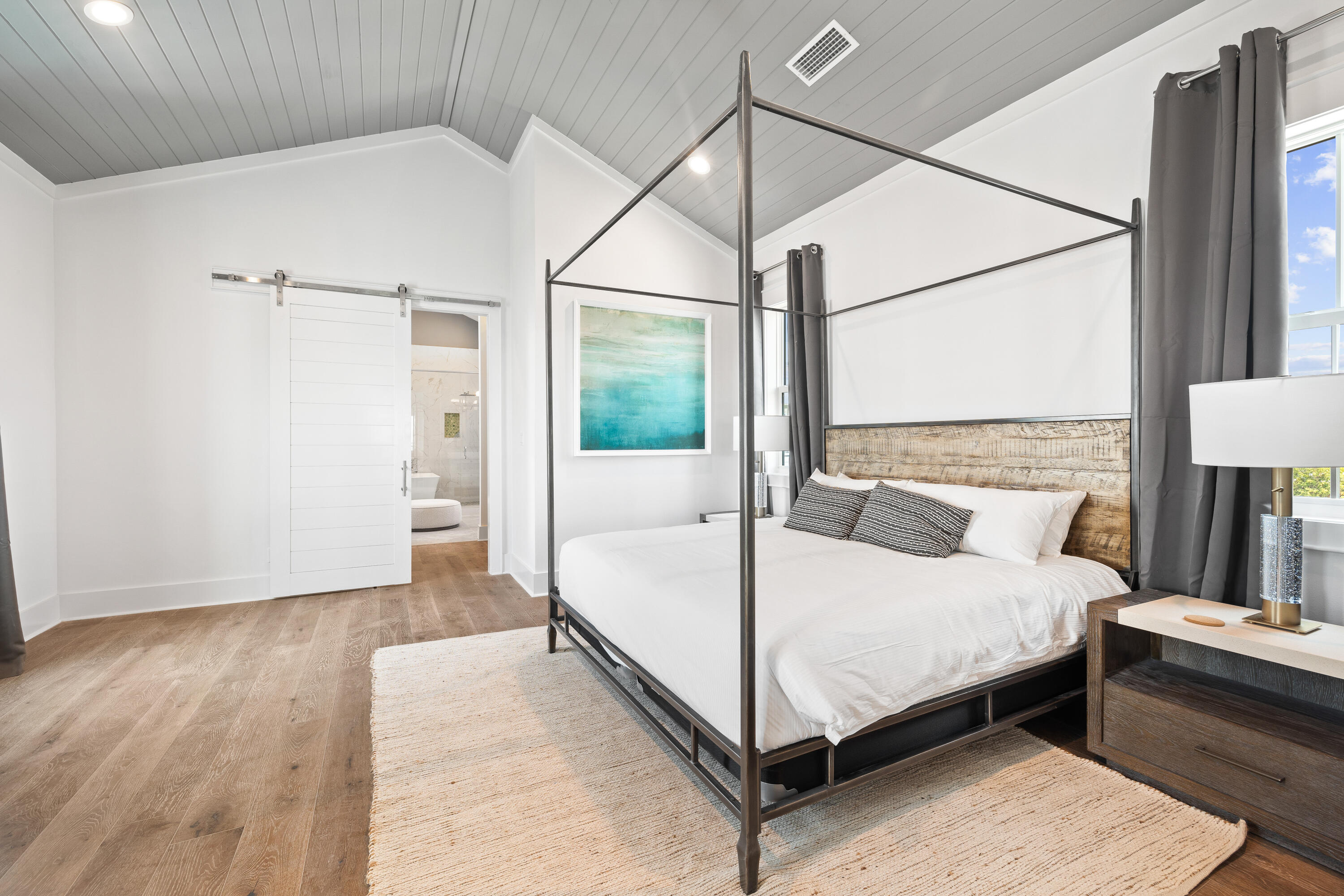 196 South Wall Street Inlet Beach, FL 32461 - Photo 65 of 85 a bedroom with a bed and a lamp