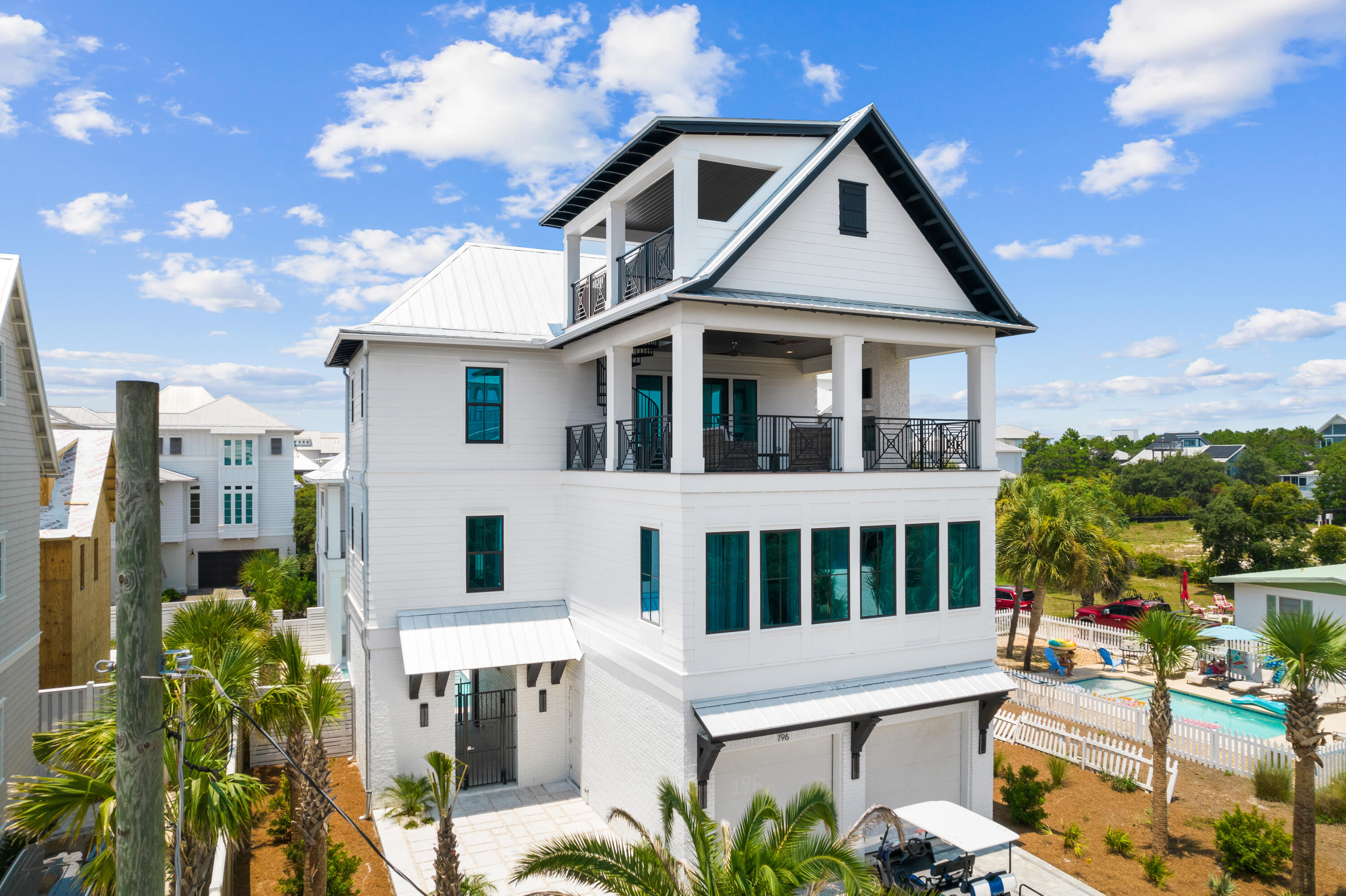 196 South Wall Street Inlet Beach, FL 32461 - Photo 10 of 85 a front view of a house with a garden