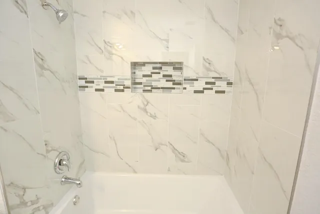 a bathroom with a bathtub