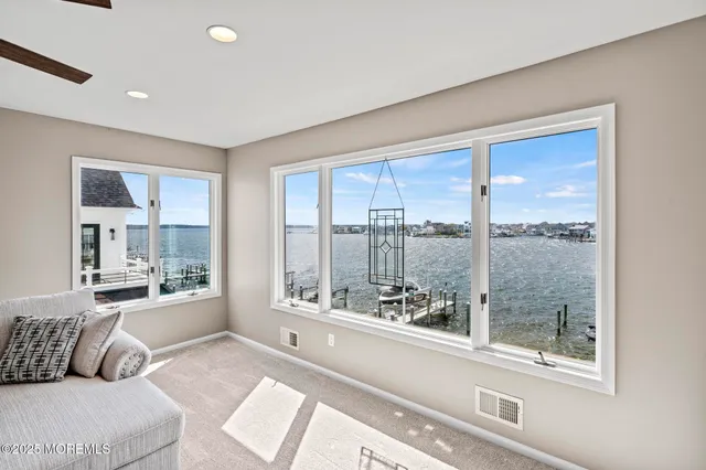 a view of a patio with table and chairs