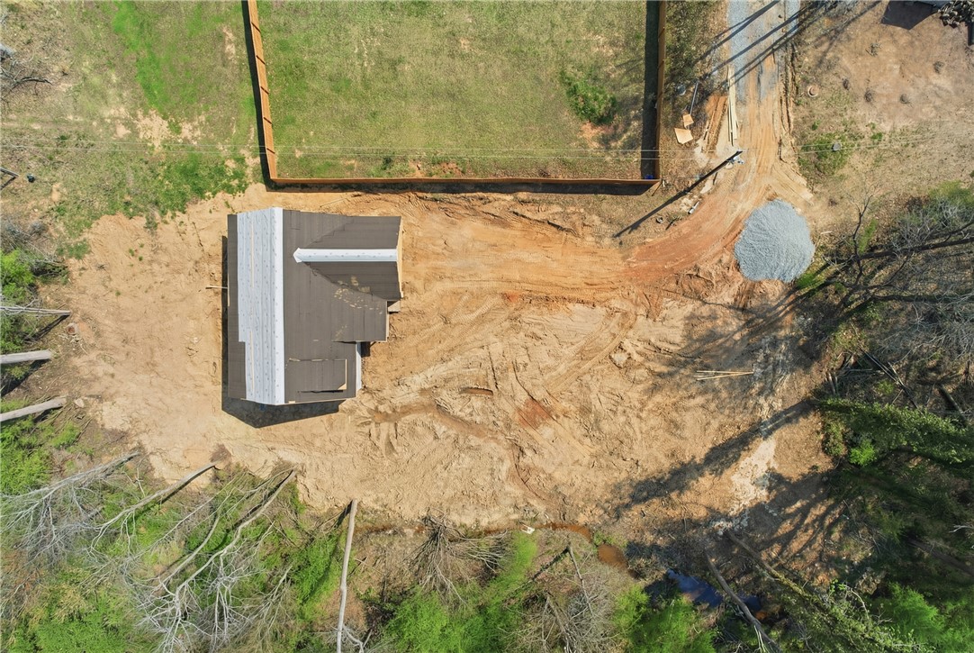104 Albert Drive Honea Path, SC 29654 - Photo 22 of 32 This aerial perspective showcases a developing property with a new roof and surrounding landscape.