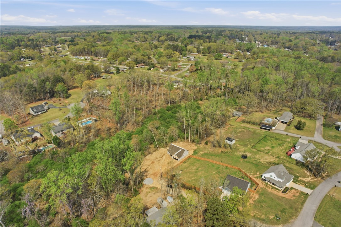 104 Albert Drive Honea Path, SC 29654 - Photo 29 of 32 View this verdant property, offering serene surroundings and ample space for outdoor pursuits.