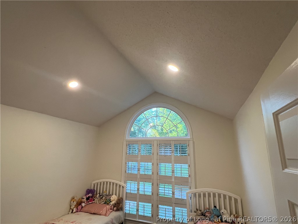 169 Bradshaw Road Bladenboro, NC 28320 - Photo 17 of 34 a bedroom with furniture and a window