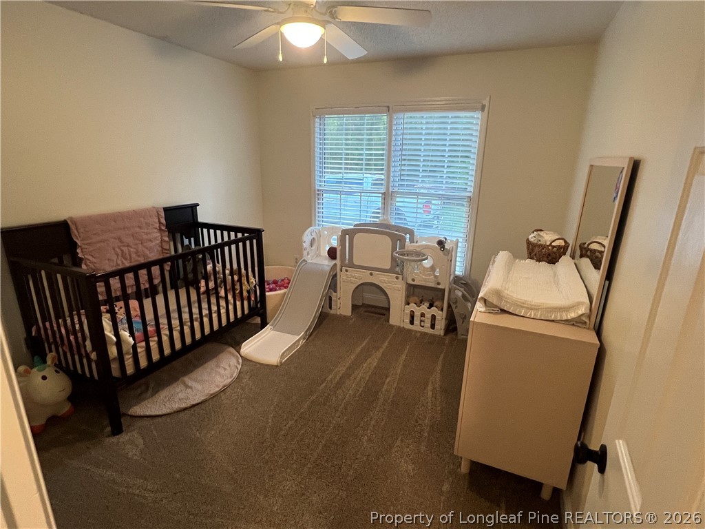 169 Bradshaw Road Bladenboro, NC 28320 - Photo 18 of 34 a bedroom with furniture and a window