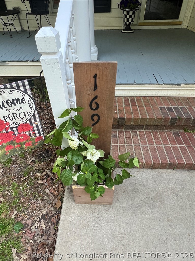 169 Bradshaw Road Bladenboro, NC 28320 - Photo 2 of 34 a view of entryway with flower pots