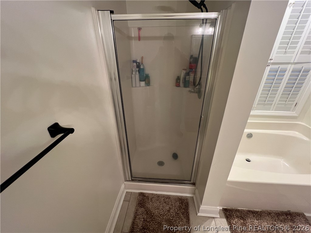 169 Bradshaw Road Bladenboro, NC 28320 - Photo 21 of 34 a bathroom with a shower