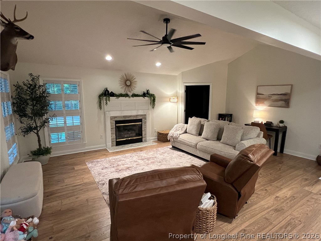 169 Bradshaw Road Bladenboro, NC 28320 - Photo 3 of 34 a living room with furniture and a fireplace