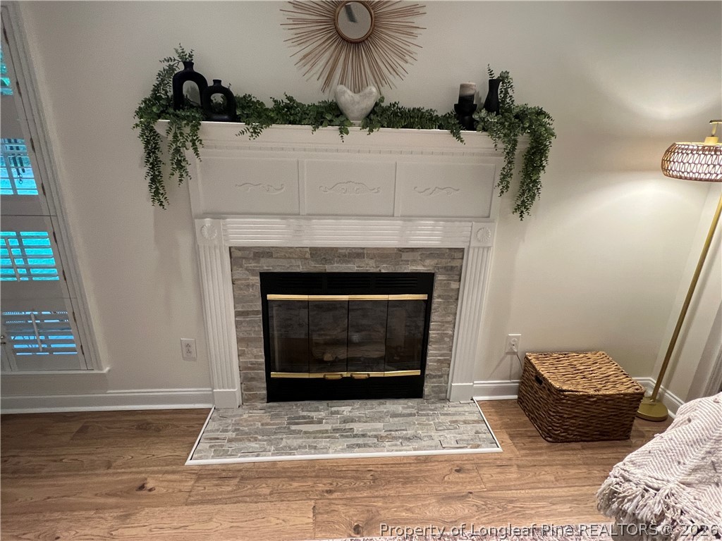 169 Bradshaw Road Bladenboro, NC 28320 - Photo 4 of 34 a living room with furniture and a fireplace