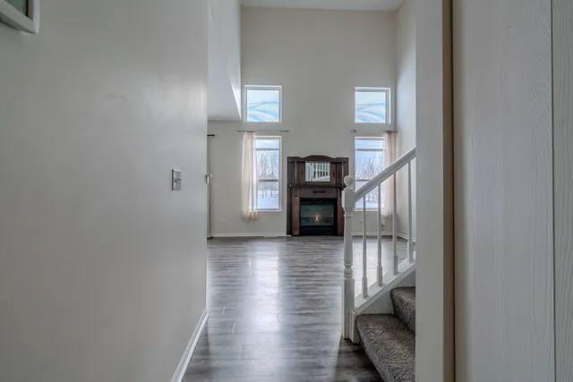 a view of livingroom with furniture and fireplace