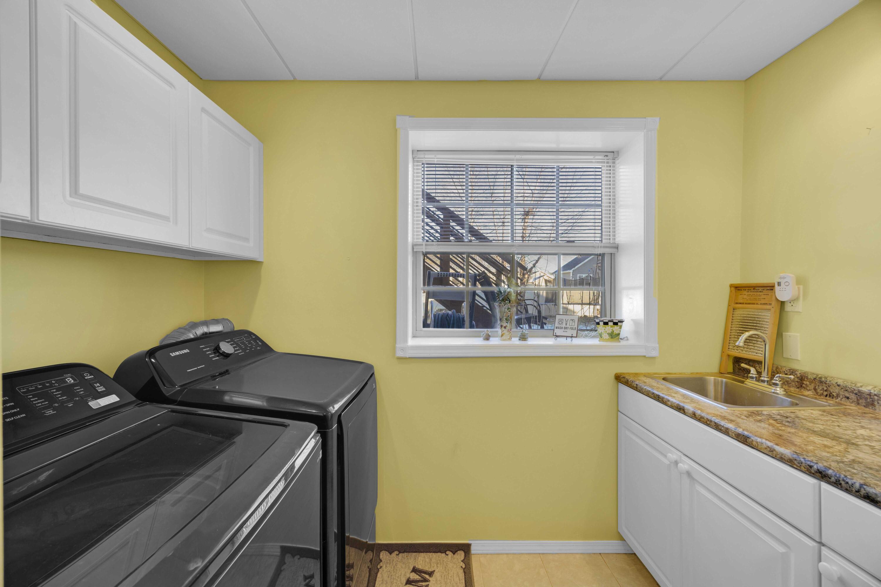 822 Seminole Drive Lowell, IN 46356 - Photo 12 of 28 a bathroom with a granite countertop sink and a stove