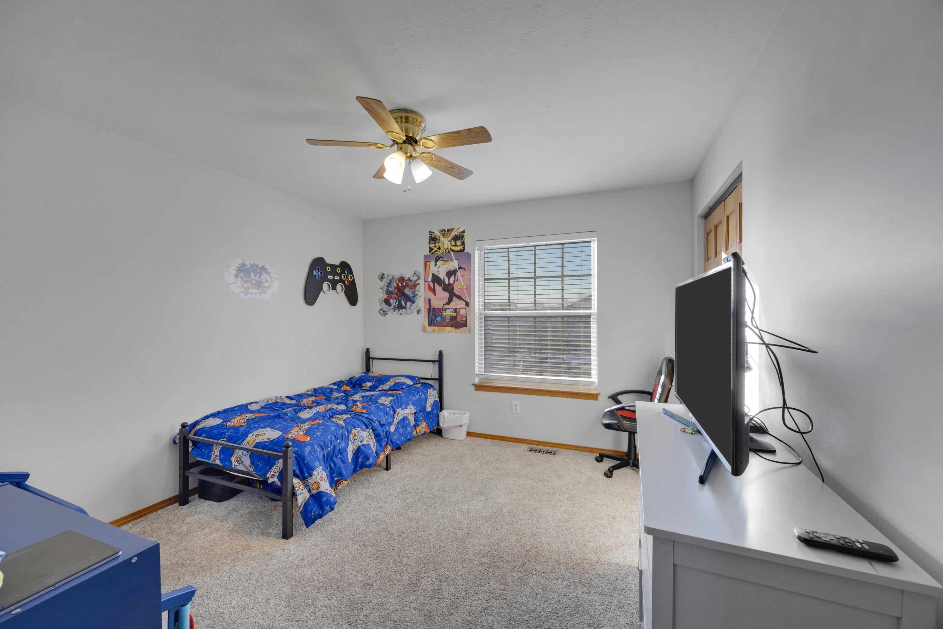 822 Seminole Drive Lowell, IN 46356 - Photo 16 of 28 a bedroom with furniture and a window