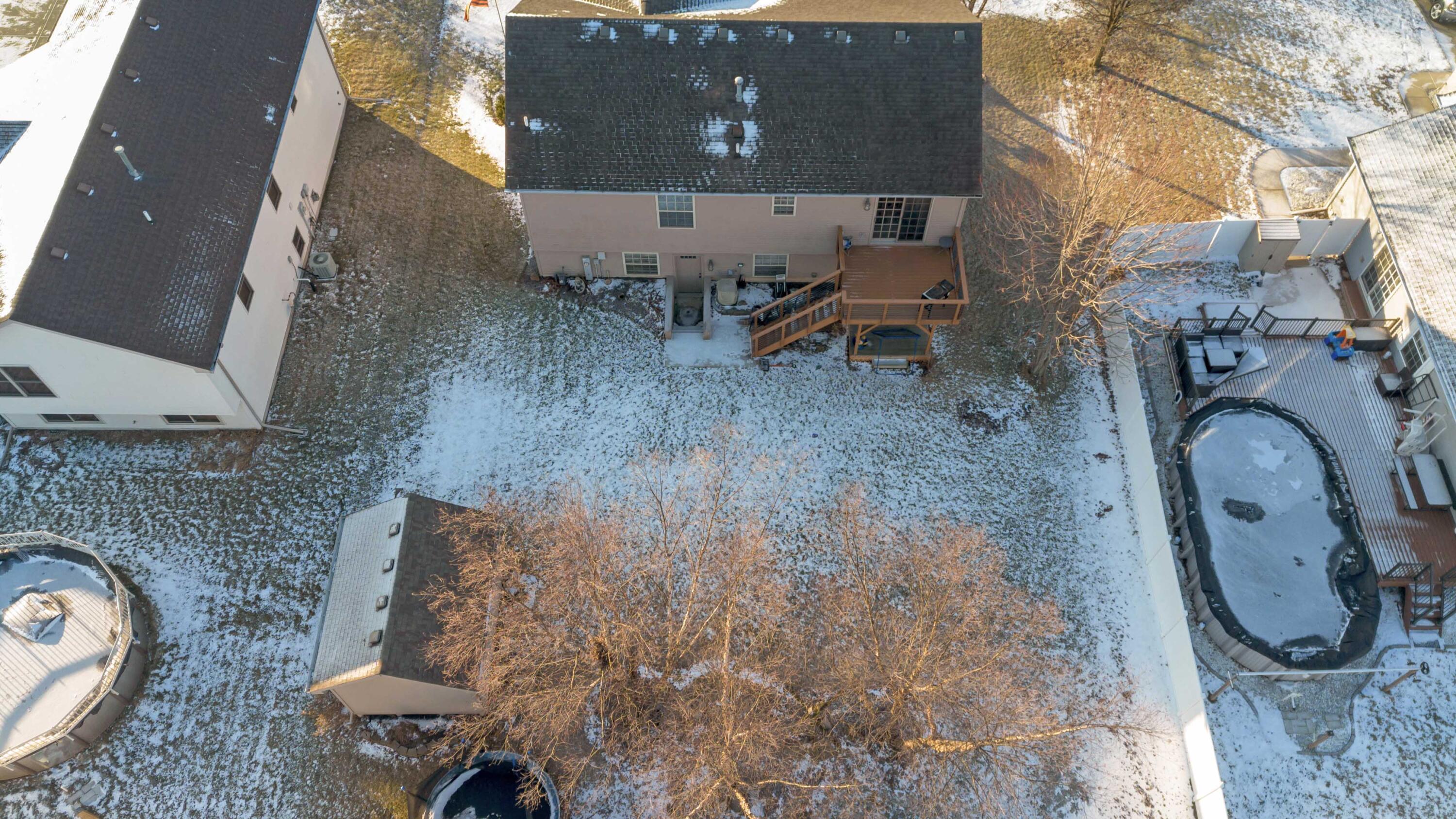 822 Seminole Drive Lowell, IN 46356 - Photo 4 of 28 an aerial view of a house with garden space and parking