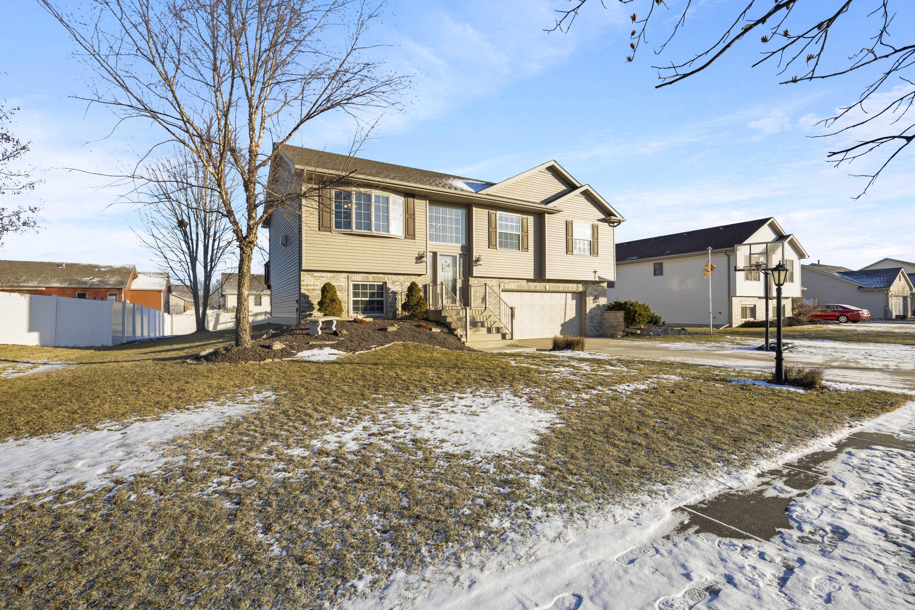 822 Seminole Drive Lowell, IN 46356 - Photo 7 of 28 a view of a town with snow on the road