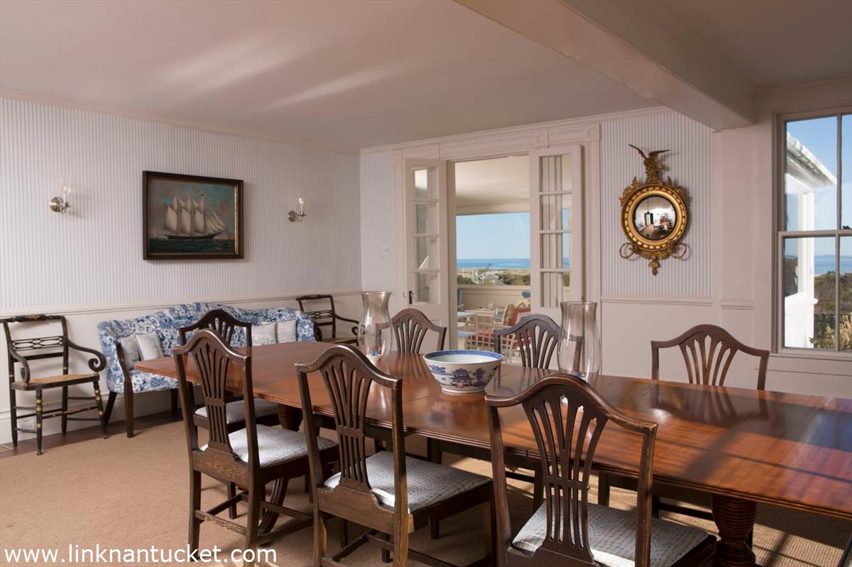 47 Cliff Road Nantucket, MA 02554 - Photo 15 of 22 a view of a dining room with furniture