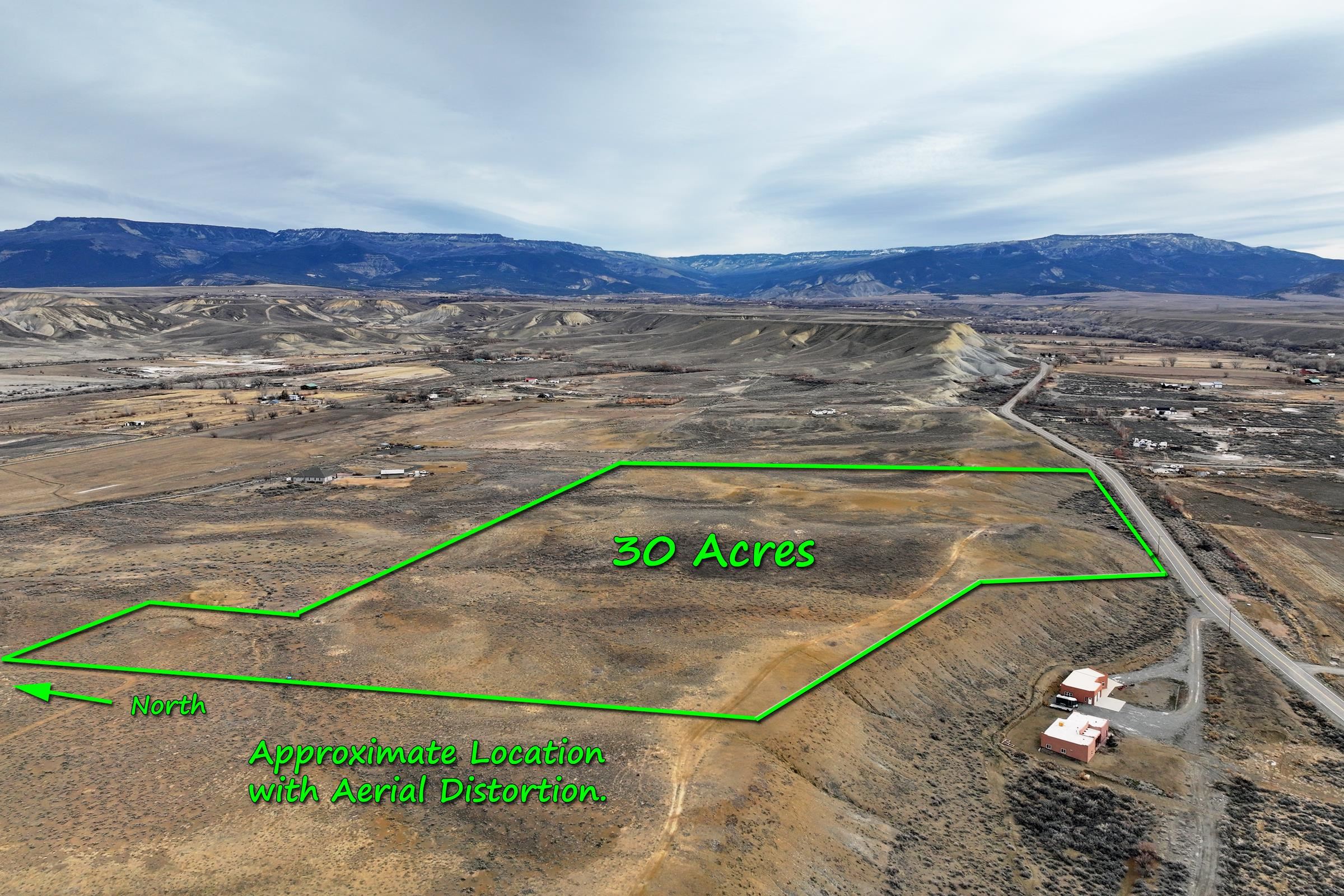 a view of a water with a mountain in the background