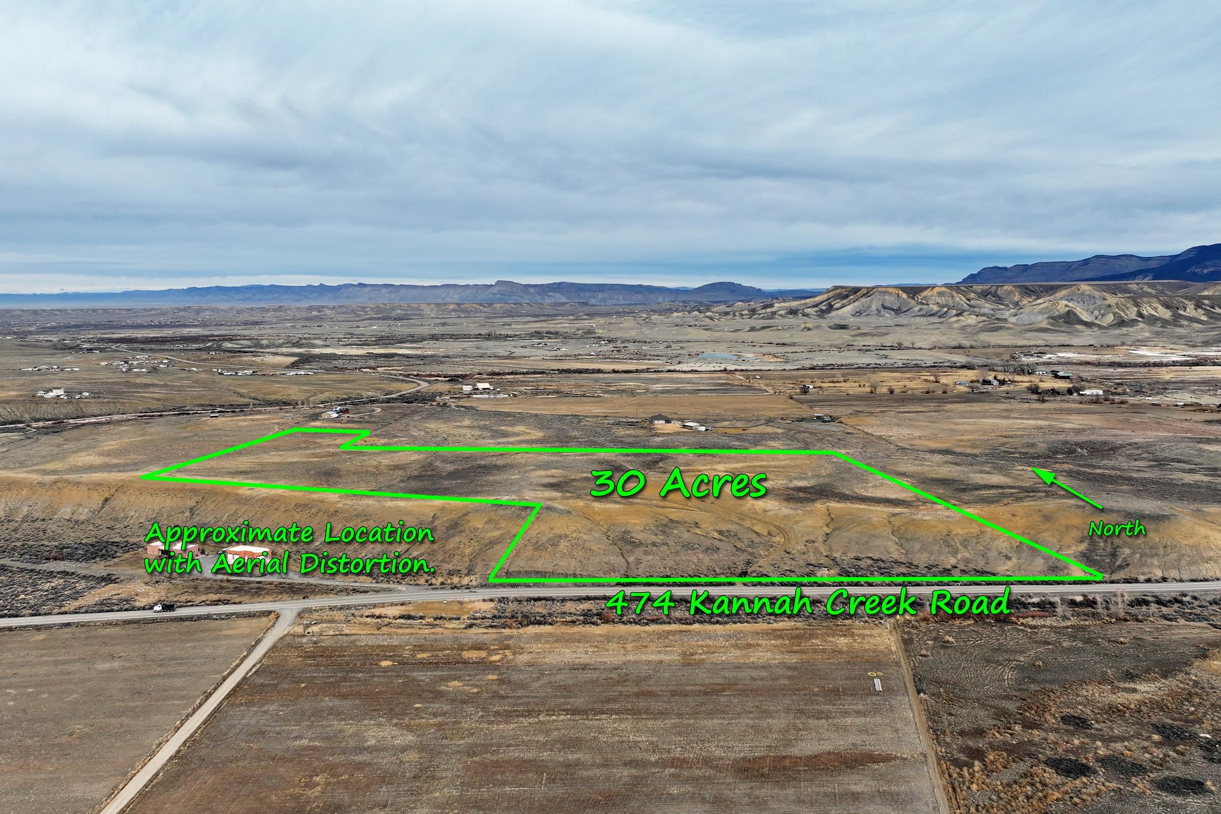 474 Kannah Creek Road Whitewater, CO 81527 - Photo 2 of 15 a view of a water with beach and mountain view