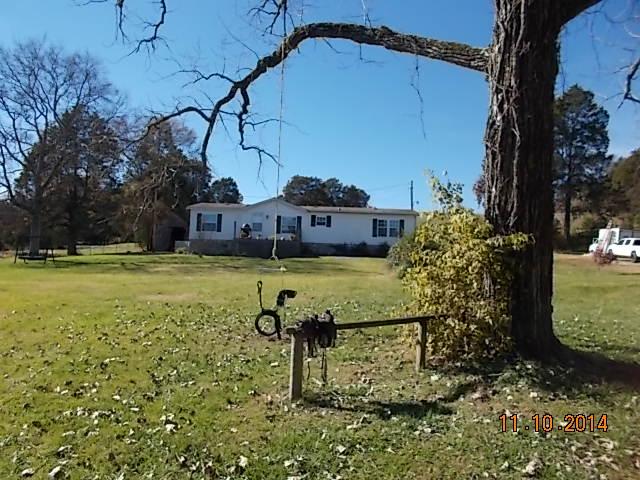 548 Rome Road Riddleton, TN 37151 - Photo 2 of 20 a view of a yard with an outdoor space